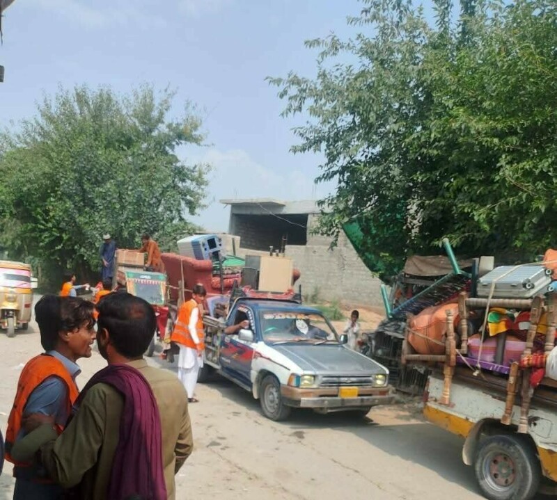  متاثرہ علاقے سے نقل مکانی کرنے والے افراد (تصویر: الخدمت) 