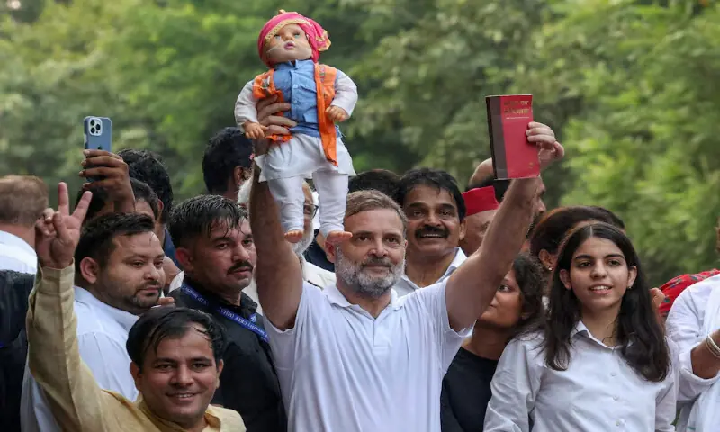 Congress leader and Leader of the Opposition Rahul Gandhi holds a doll depicting Indian Prime Minister Narendra Modi as opposition parties march to the Supreme Court to protest a controversial revision of voter lists that has sparked days of unrest, in New Delhi, India, on October 12, 2026. Reuters